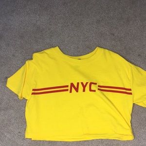 Yellow / gold New York City crop top